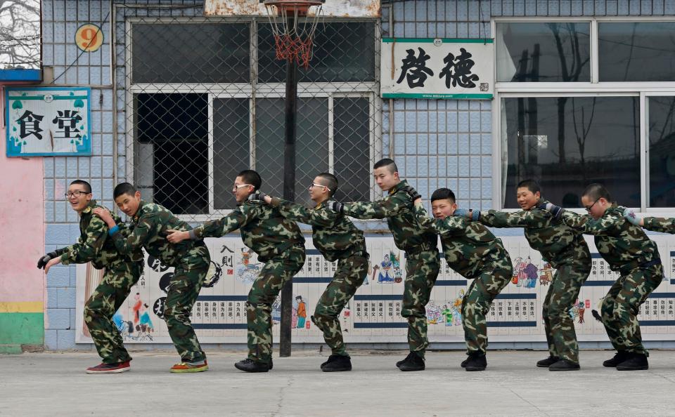  Students are pushed hard and have to obey military-style orders and carry out drills every morning