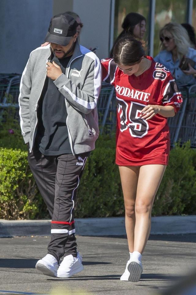  Selena, 25, flashed her toned legs in a sexy oversized sports shirt