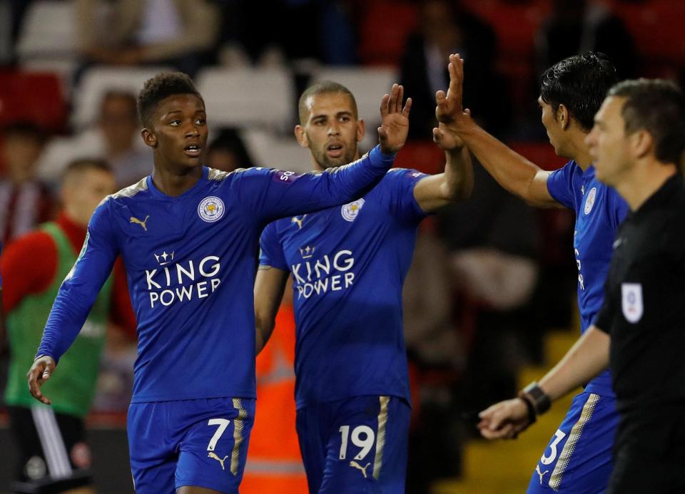 Demarai Gray celebrates his openerwith Ahmed Musa and Islam Slimani