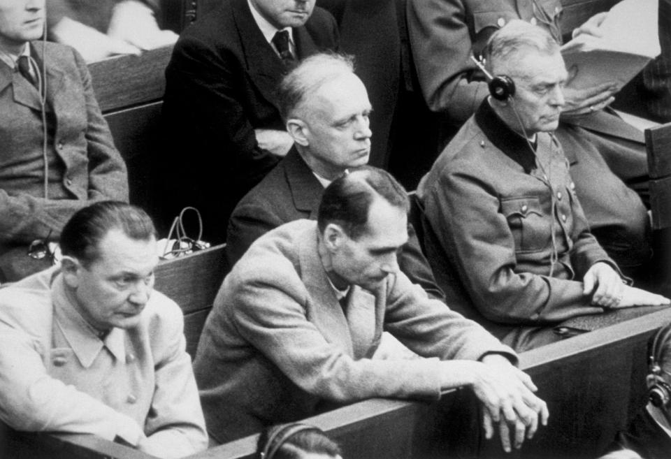  Hess, pictured at the Nuremberg Trials, justified his racial politics with occult nonsense