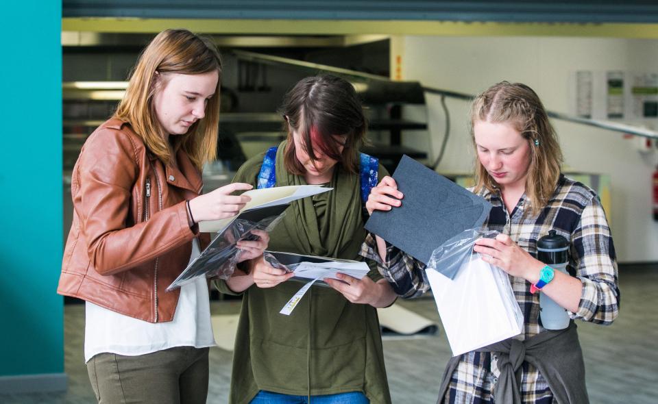  Pupils at Plymstock School in Devon comparing their results with one another