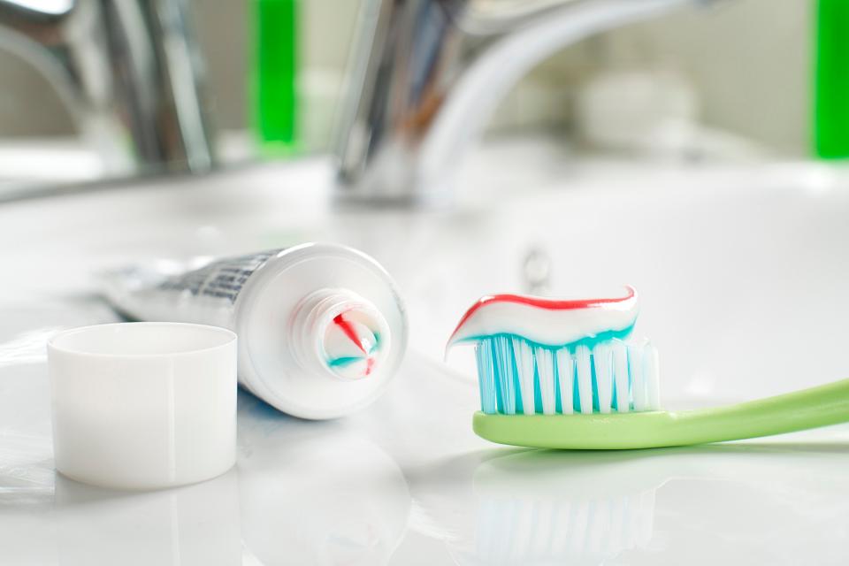  Cut along the bottom to get a few more days out of your toothpaste