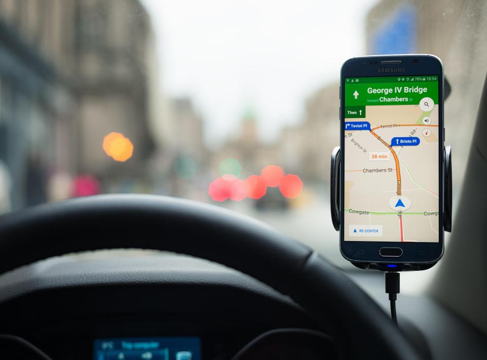 It is not illegal to use navigation apps but motorists could be prosecuted for touching the handset while driving