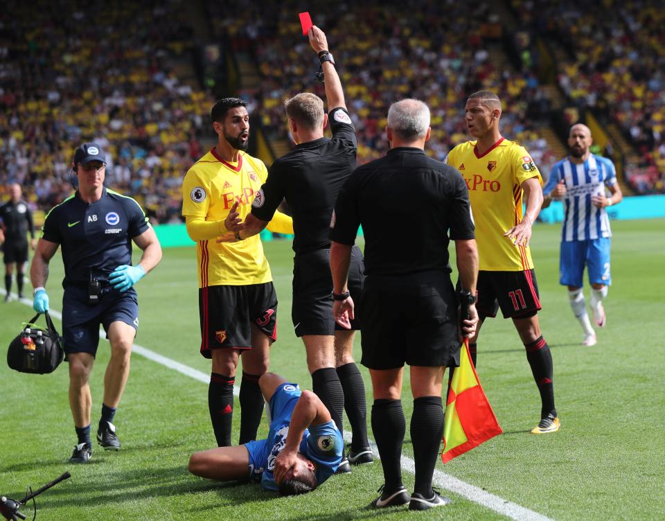  Miguel Britos is shown a straight red card for terrible two-footed lunge