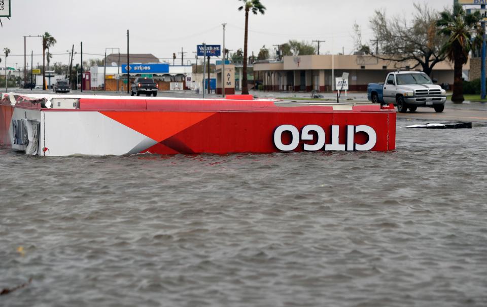 The roof of a gas station sits in flood waters in the wake of Hurricane Harvey in Aransas, Texas