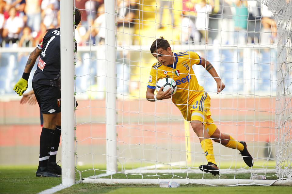 Paulo Dybala shows his determination as he get the ball out of the net