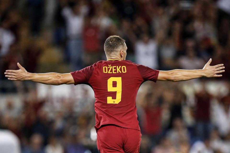  Edin Dzeko celebrates after his opening goal for Roma during first half