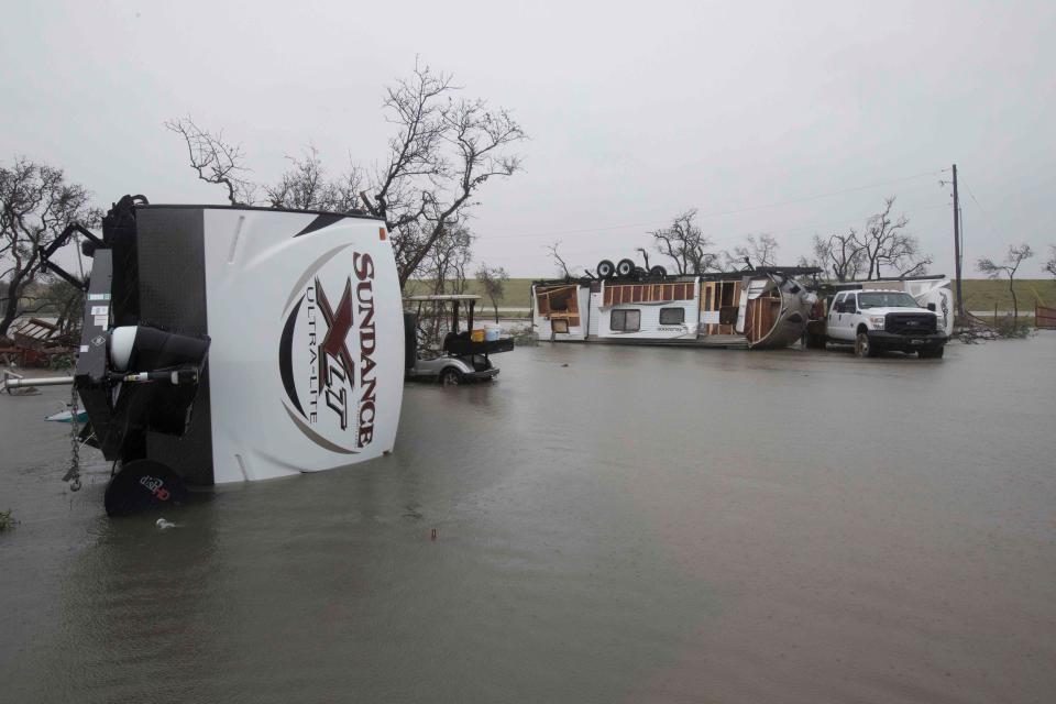  Mobile homes are upended in the Paradise Lagoons RV Resort in Aransas Pass, Texa