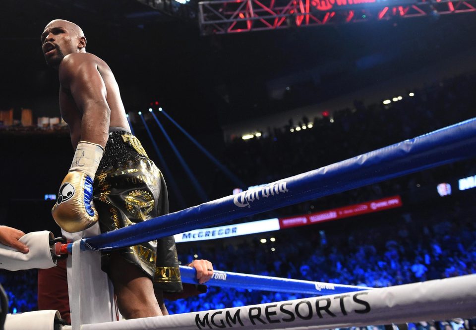 Floyd Mayweather rushes off to celebrate his 50th professional win