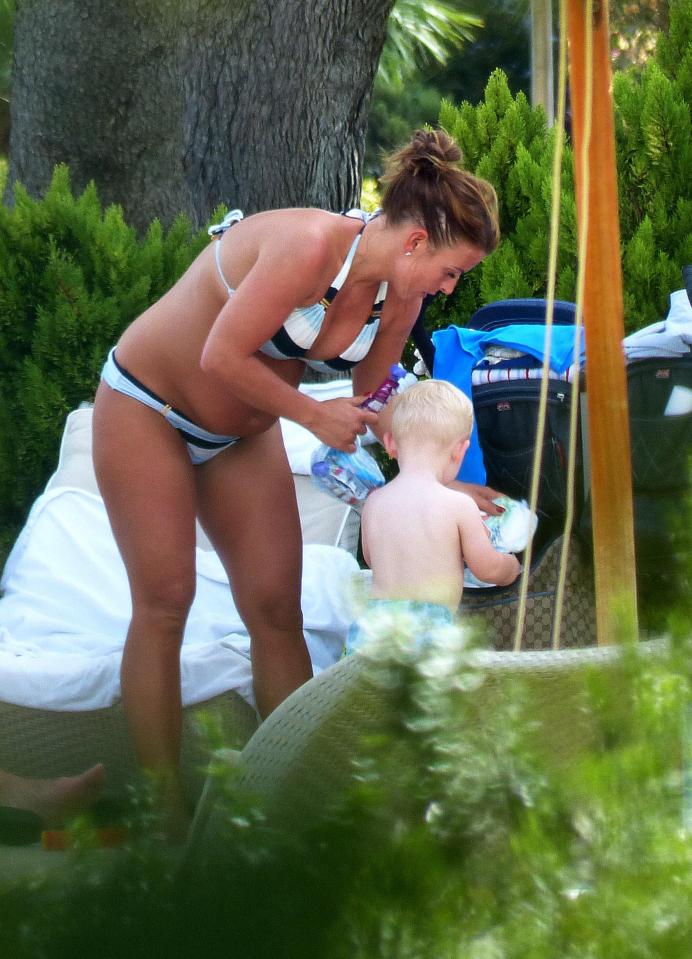  Coleen helps son Kit get things from the buggy