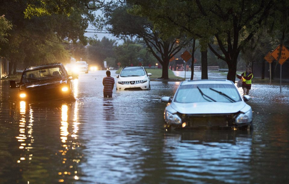 Drivers were forced to leave their vehicles in the water