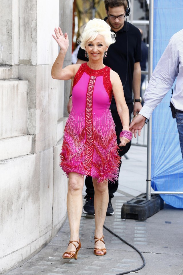 Debbie McGee was all in hot pink and red