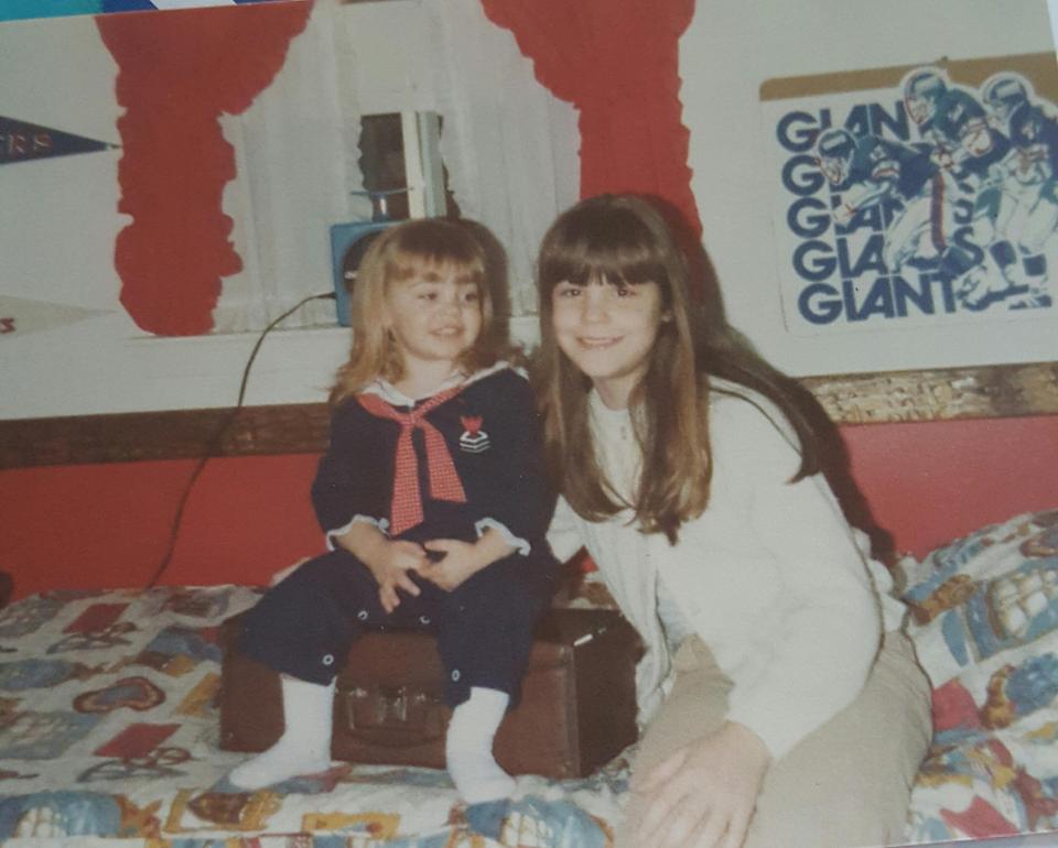  Cheryl with her baby sister JoAnn in the 1980s. Her dad had threatened to move on to JoAnn at one point