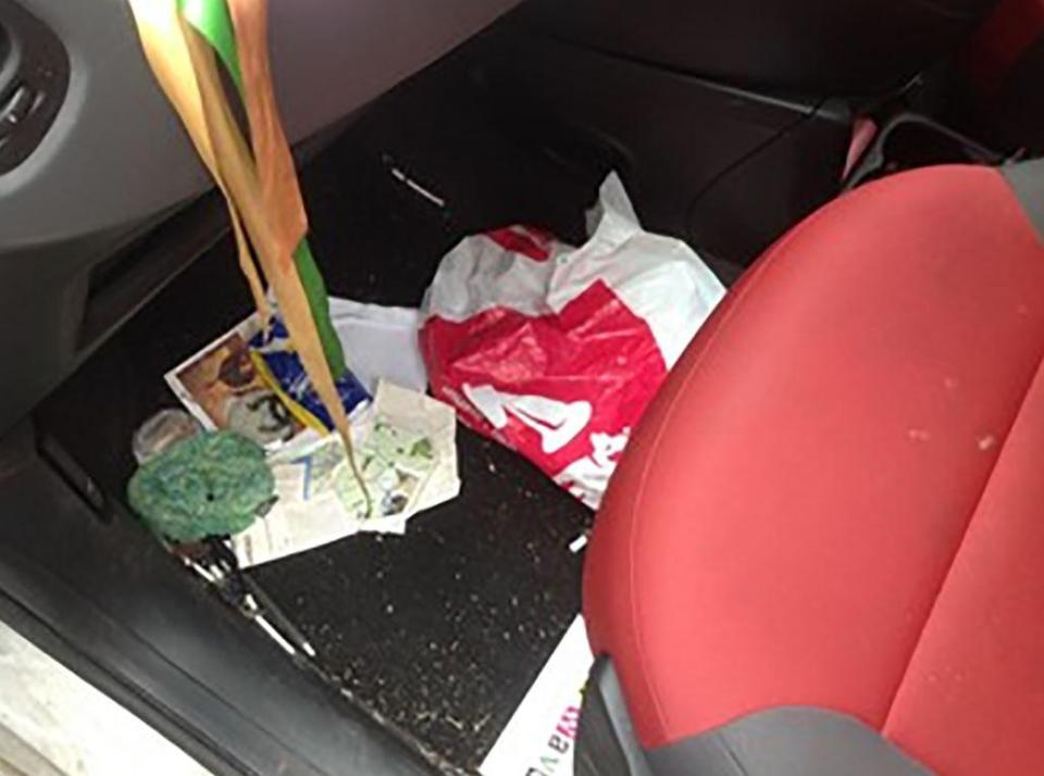  Clothes, shoes and rubbish are seen strewn across the footwells of cars across the country