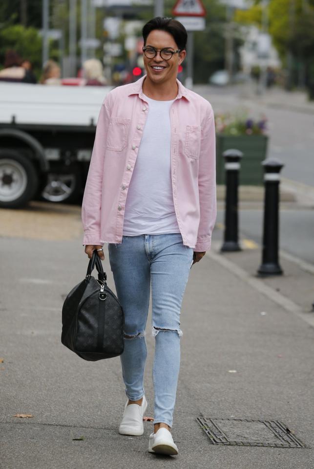  Bobby Cole Norris stood out in a baby pink shirt left unbuttoned over a white T-shirt