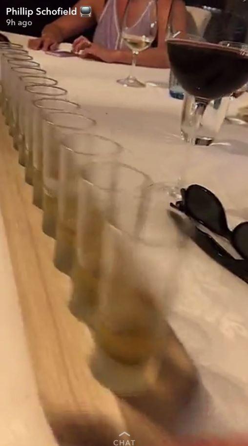  A tray of shots was getting passed around between the diners