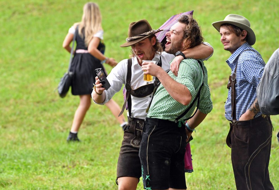  Visitors to the festival all the way from Australia enjoy the beer