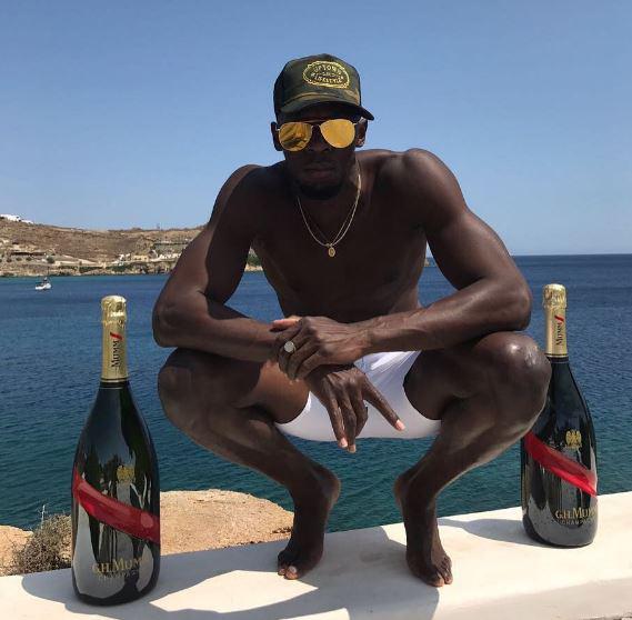  Last week Bolt was pictured with two giant bottles of champagne as he continues to celebrate retirement