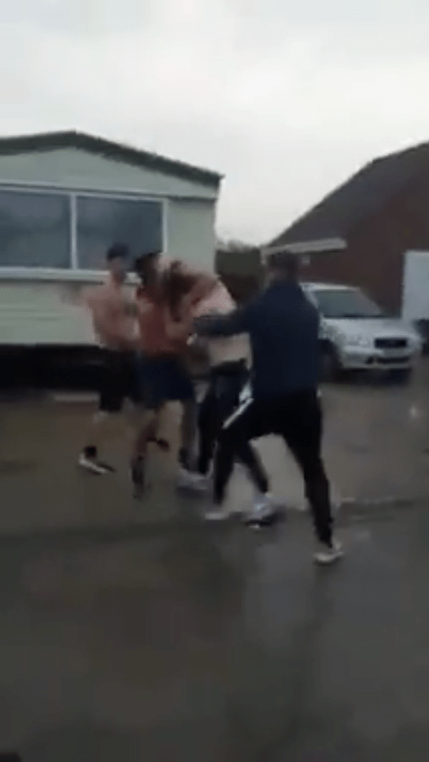  He then gets his opponent in a headlock as the crowd intervenes