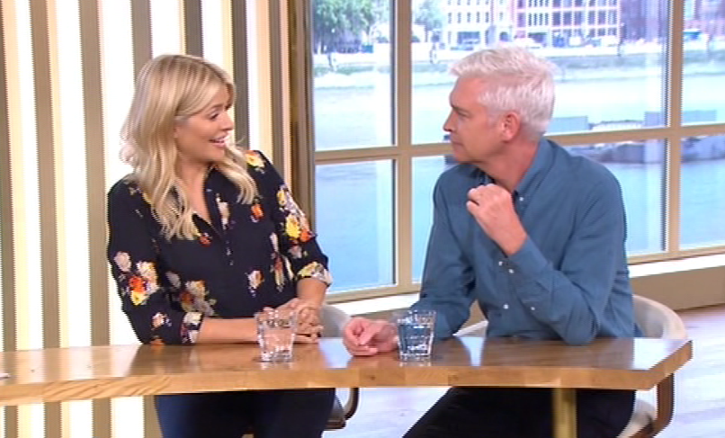  The pair giggled away as they talked about their new dog