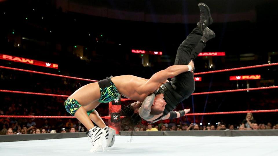  Jason Jordan slams Roman with a northern lights suplex