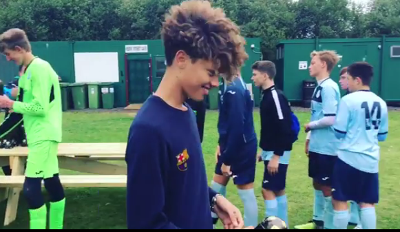  Bobby grinned from ear to ear as he lined up with his team mates to be awarded with their prize