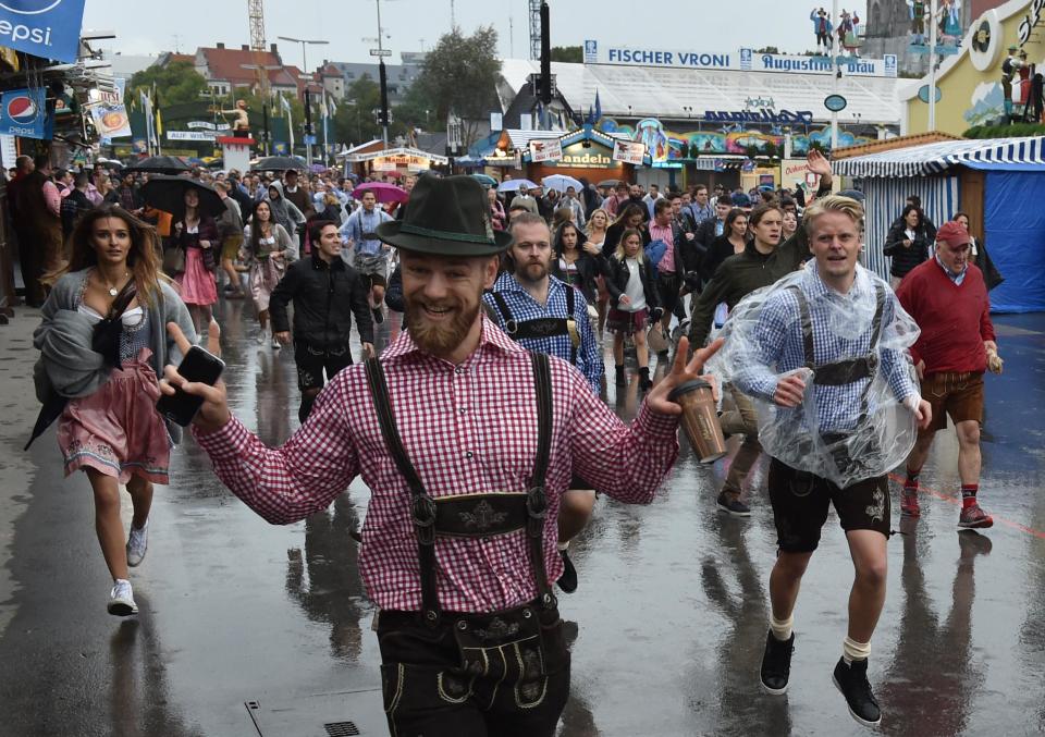  Men at the festival often opt to wear the traditional outfit of lederhose