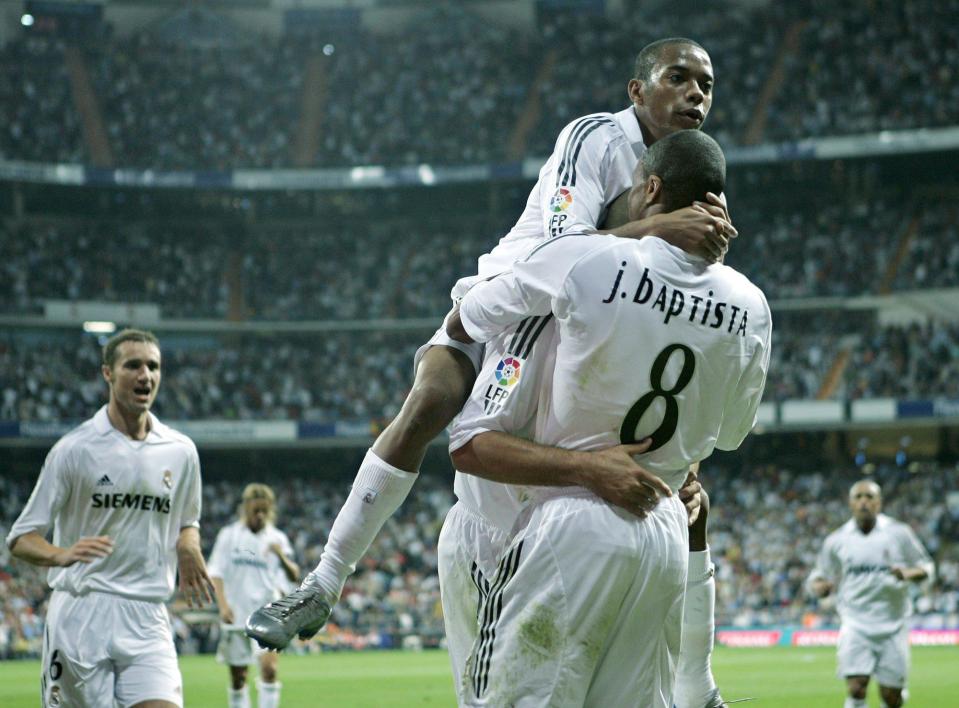 Baptista celebrates a goal for Real Madrid with team-mate Robinho