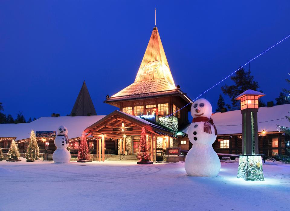  The Santa Claus village at night was lit up with pretty lights and snowy surprises