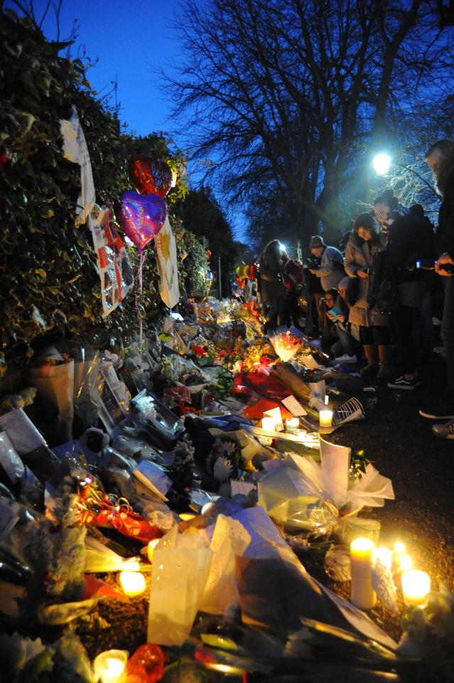  Fans build a shrine for singer George Michael outside his home in north London