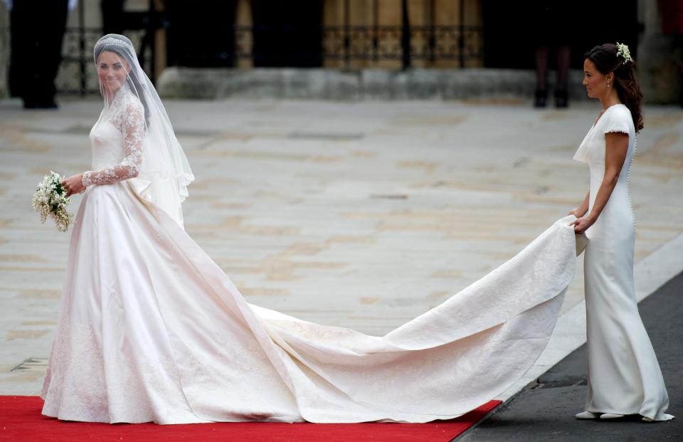  Kate stole the show in a long-sleeved lace gown that went on display at Buckingham Palace during a summer exhibition