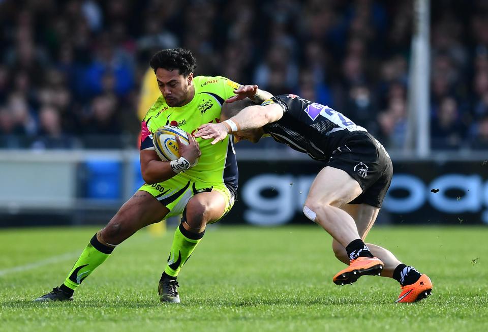  Denny Solomona of Sale Sharks is tackled by James Short of Exeter Chiefs last season