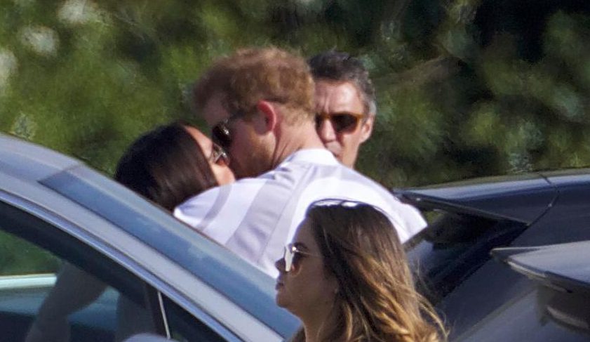  The loved-up couple kiss at polo back in May