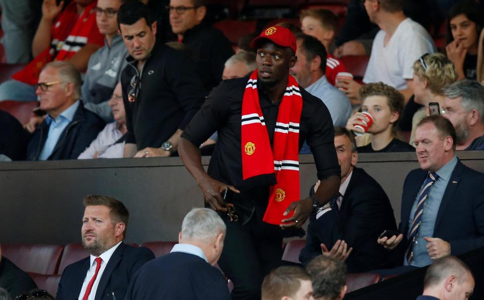  Bolt pictured in the stands at Manchester United