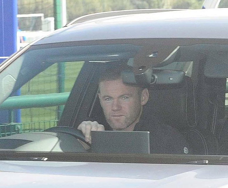  Rooney, pictured at Everton's Finch Farm training complex yesterday, was arrested on Thursday night