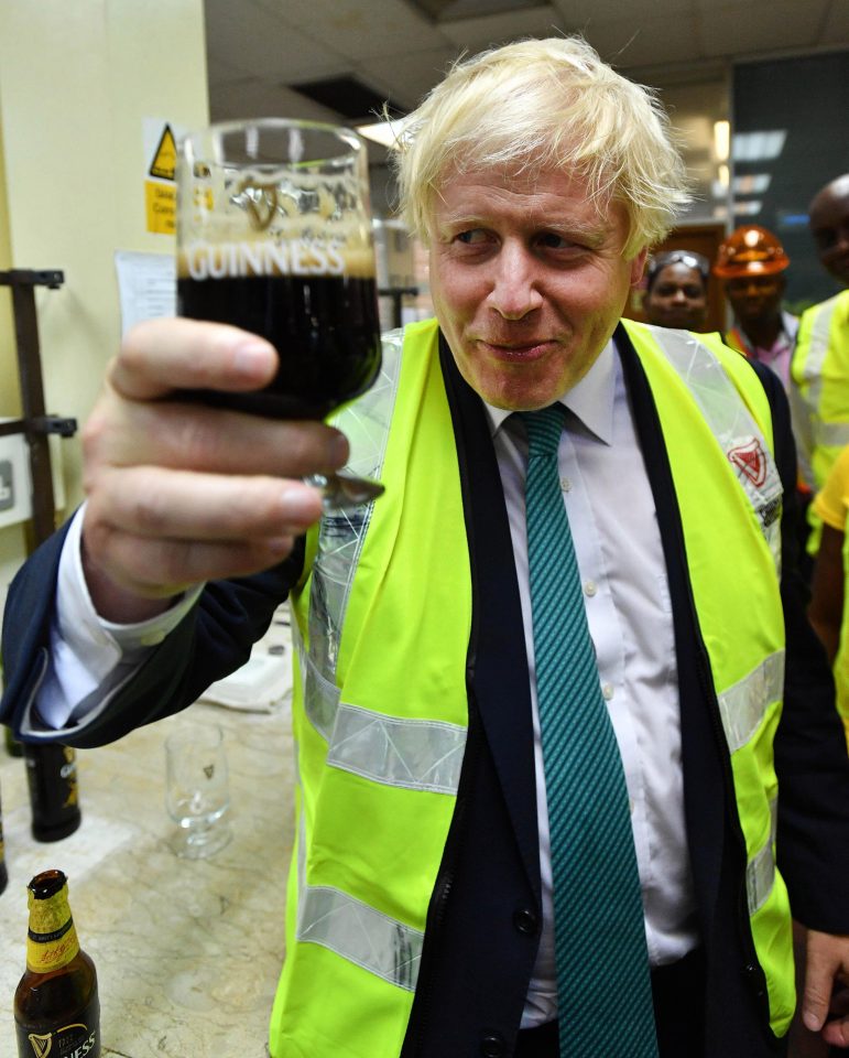  Boris Johnson samples a Guinness at the Diageo Factory in Lagos, Nigeria