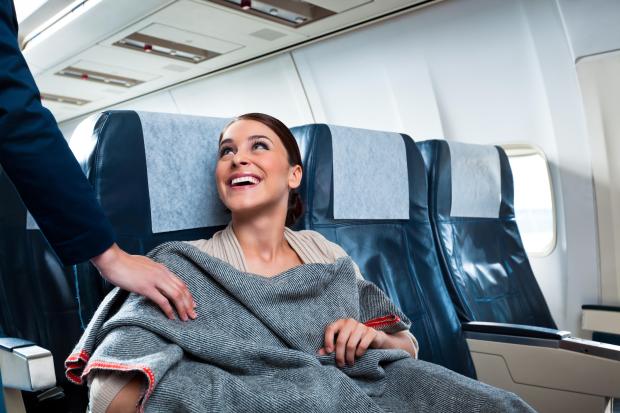 Aer Lingus passengers flying on the most basic transatlantic tickets will no longer be given free earphones and blankets