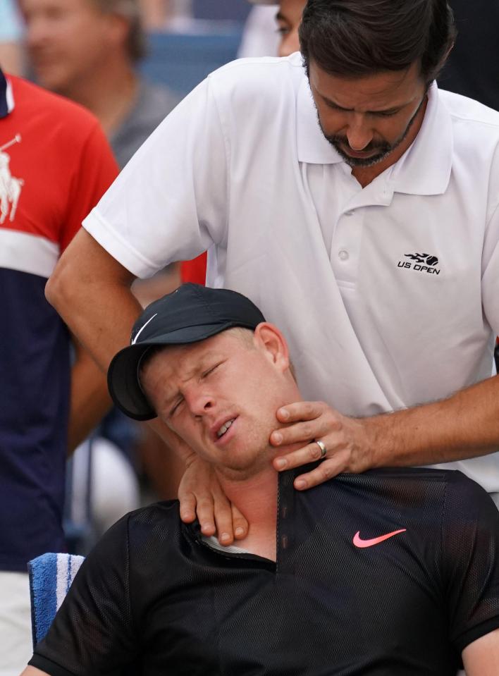  Kyle Edmund receives a neck massage during his US Open clash against Denis Shapovalov