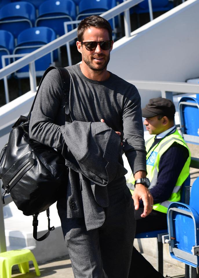 Jamie Redknapp marches down the touchline at Loftus Road