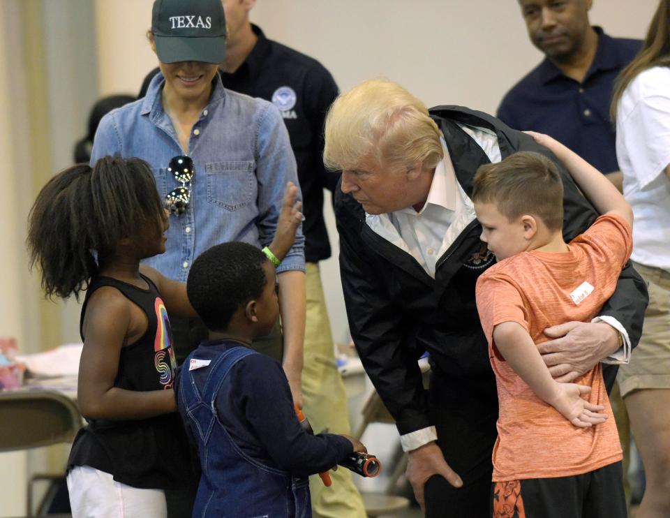 Melania wore trainers and a cap that read 'Texas', with Trump attended the relief centre without his usual tie