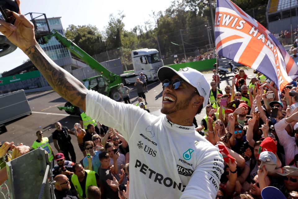 Lewis Hamilton takes a celebratory selfie after cruising to victory in Monza