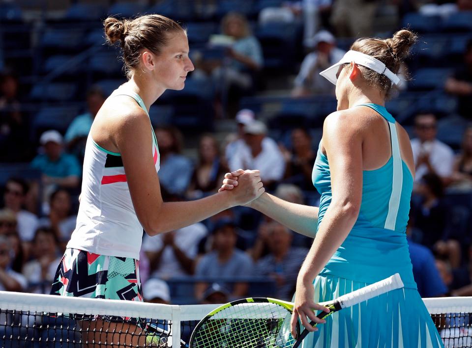  Karolina Pliskova and Jennifer Brady embrace after their fourth round clash