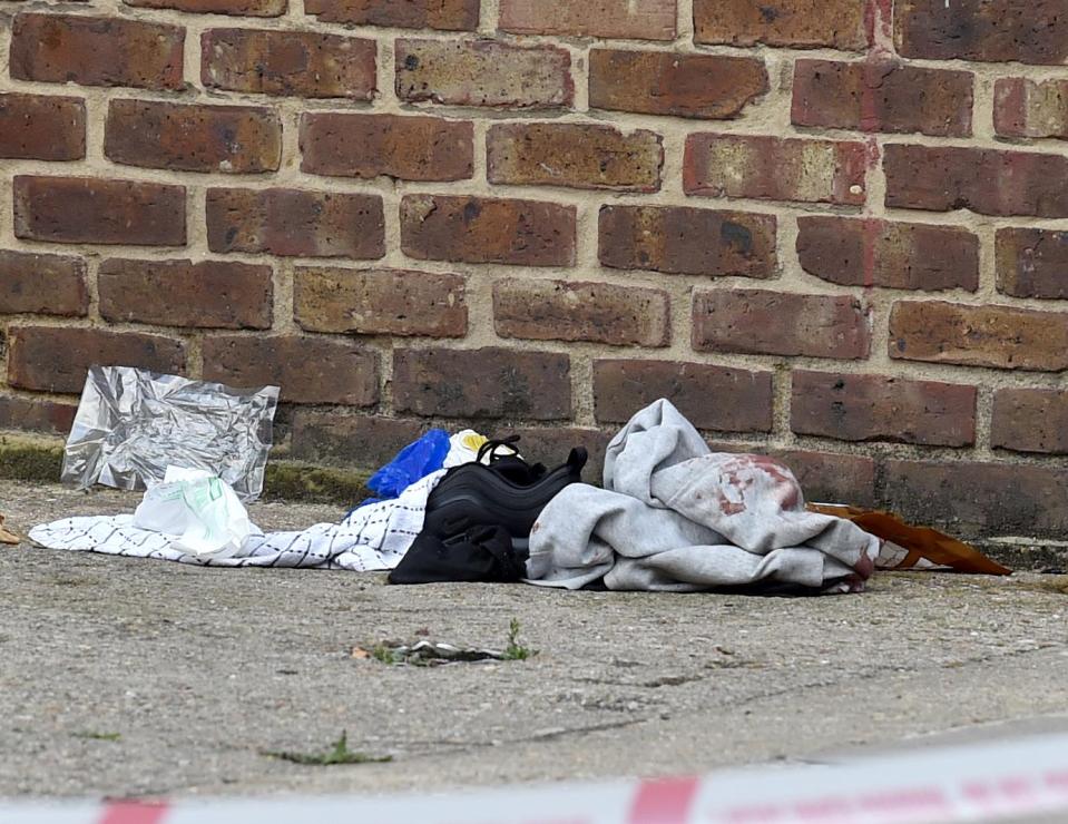  Blood-stained clothes were spotted at the scene after the double shooting