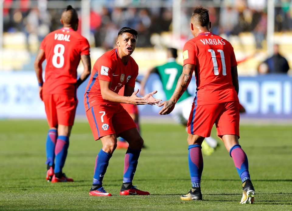 Alexis Sanchez reacts during the match against Bolivia after Eduardo Vargas missed a key chance