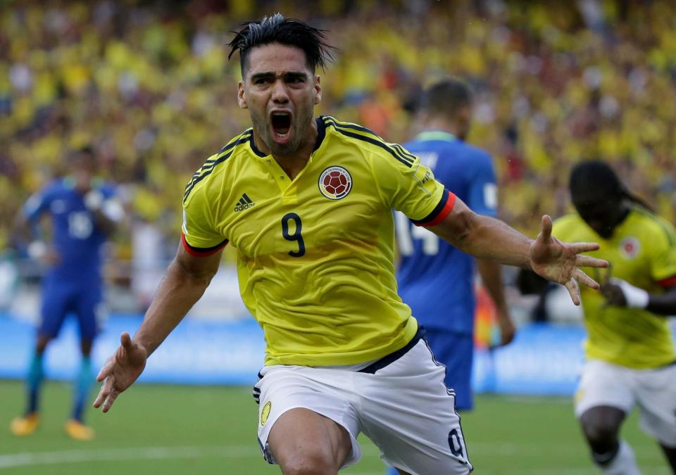  Radamel Falcao celebrates scoring an equaliser for Colombia to keep them in pole position to finish second behind Brazil