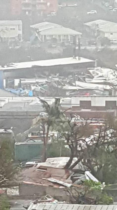  Dramatic images show how the "potentially catastrophic" storm has damaged buildings