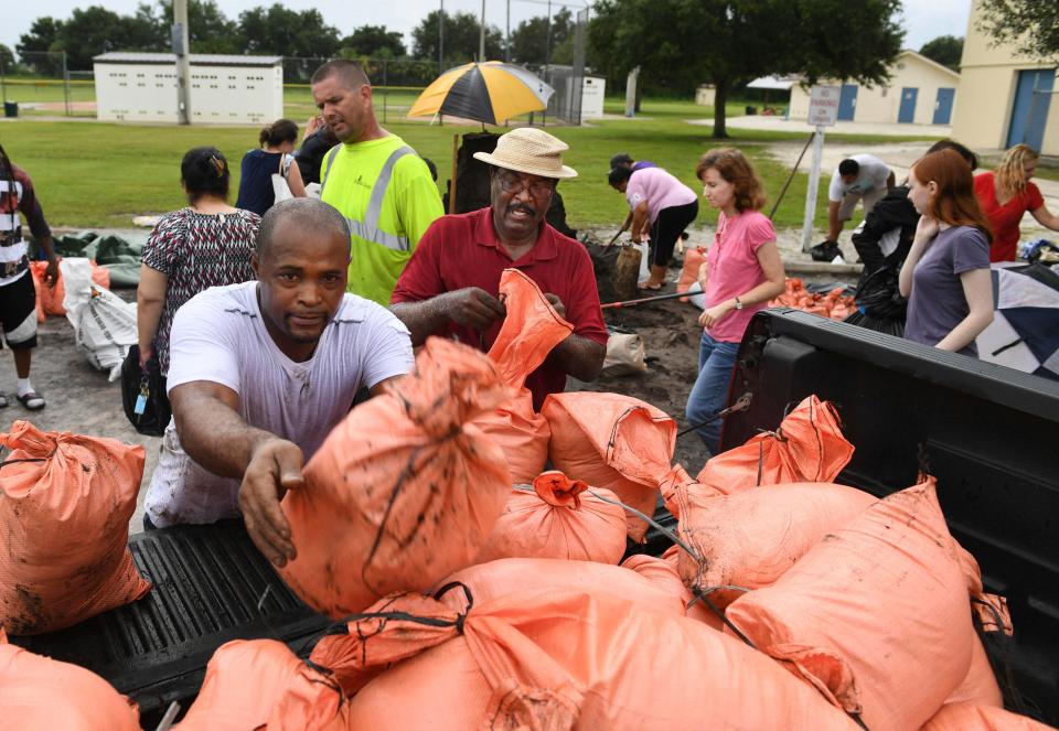  Florida residents were seen loading sandbags as they prepared for the hurricane