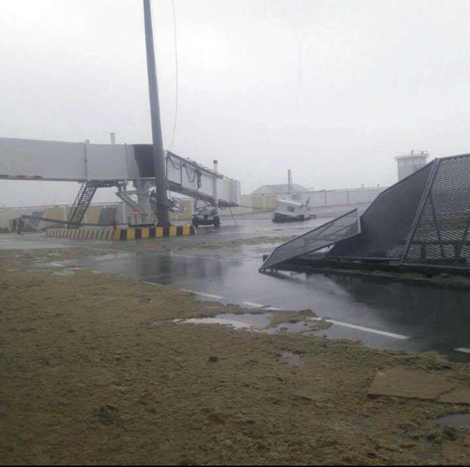  Mangled wreckage pictured at Princess Juliana Airport in St Martin