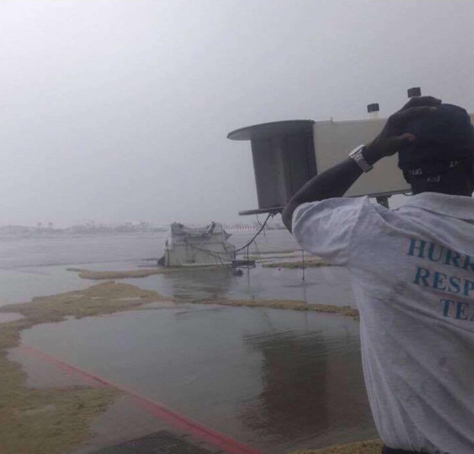  A rescue worker pictured at the beleaguered travel hub