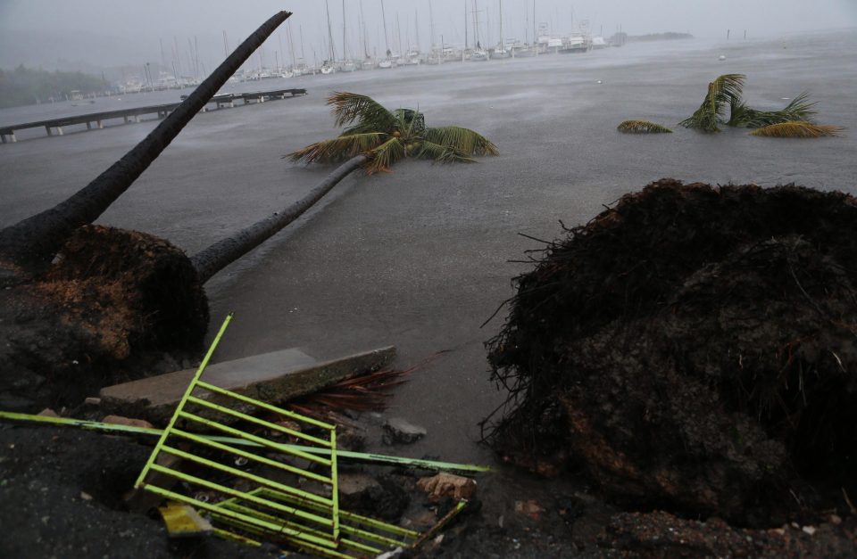  Debris is pictured during a storm surge near the Puerto Chico Harbor